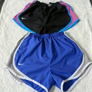 Two Nike running shorts